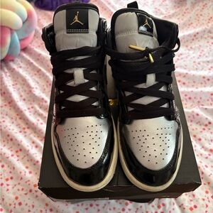 Air Jordan Black and Silver High-Top Sneakers